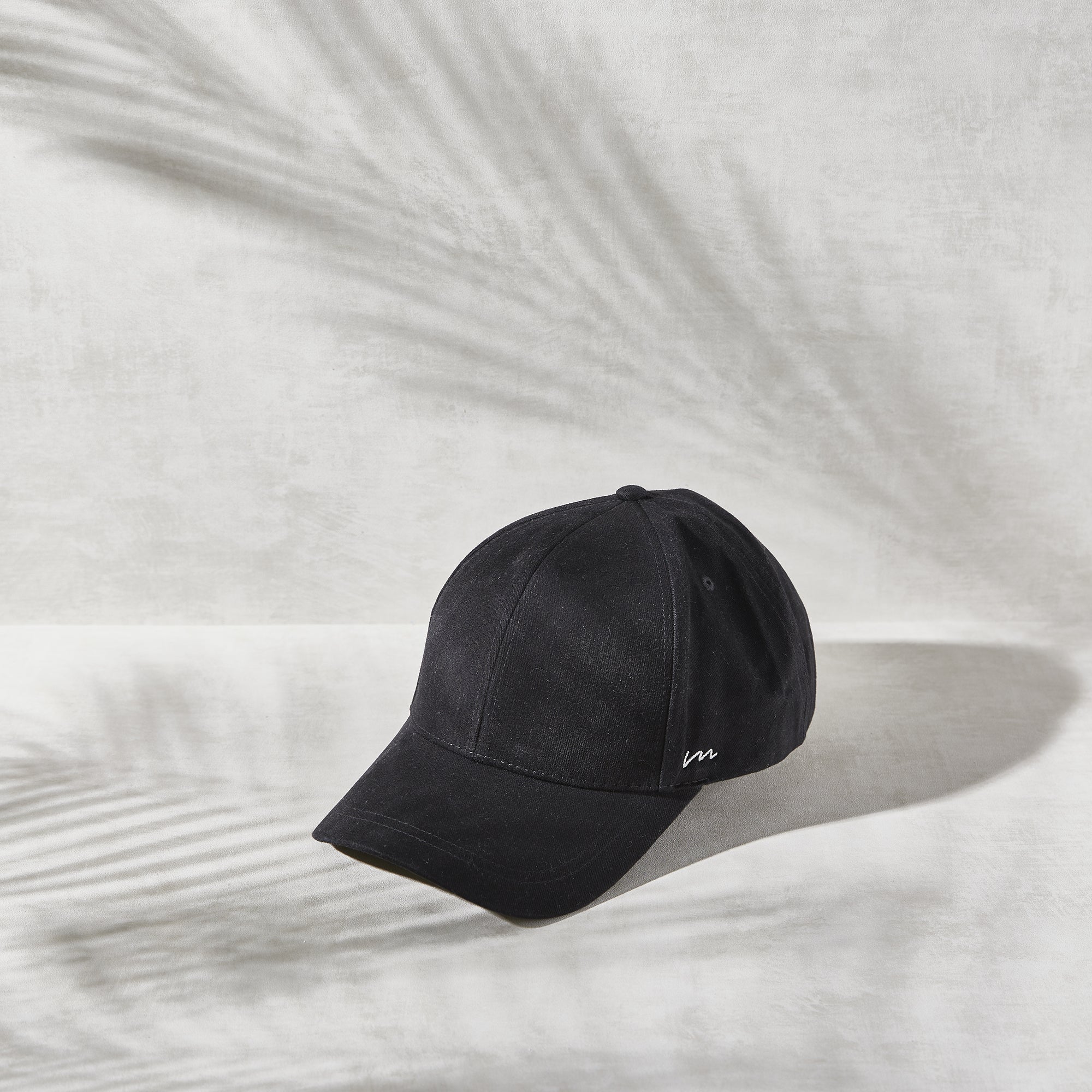 La petite casquette noire